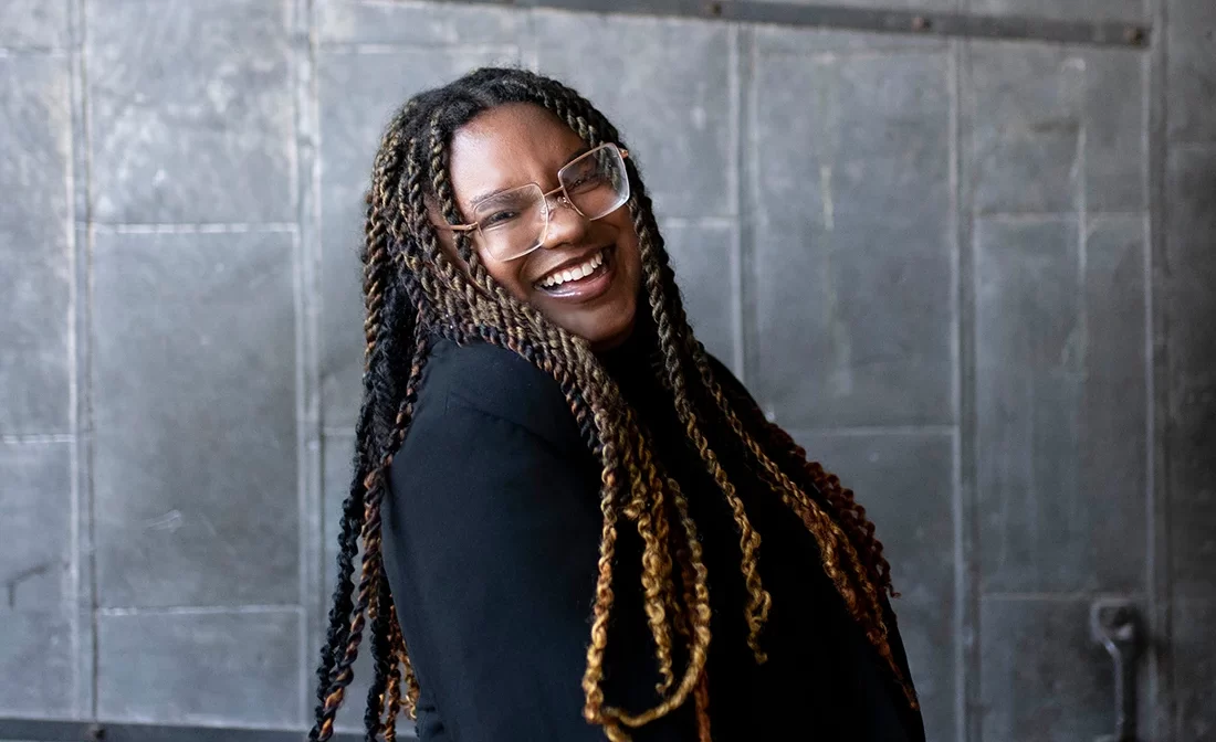 Portrait photo of Lake Thomas, a Graphic Designer at 2Shea Creative.