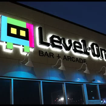 Photo of Level-One Bar + Arcade outside signage at front of building.